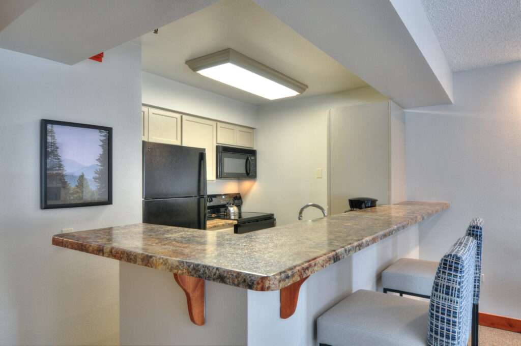 One Bedroom bar into kitchen