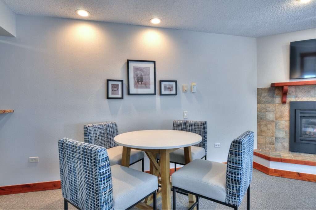 One Bedroom dining and fireplace