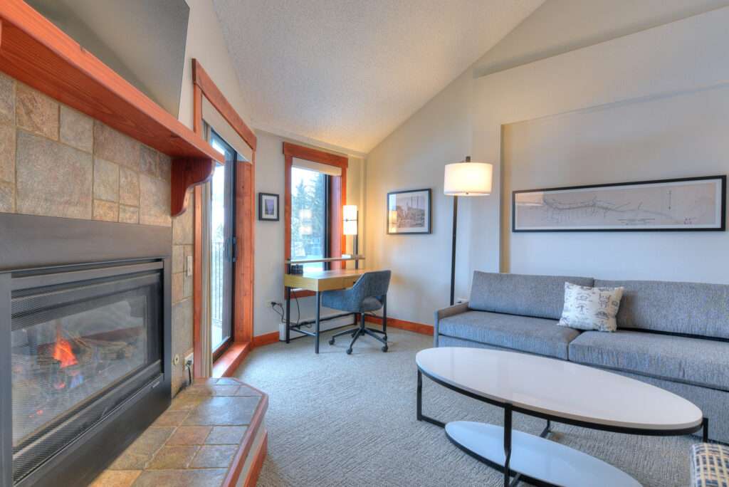 OneLoft living room and desk from dining table